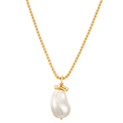 Kette mit Anhänger gelbgold Muschelkernperle weiß